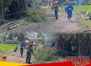 Jaga Keselamatan Pengguna Jalan, Babinsa Bersama Warga Gelar Kerja Bakti