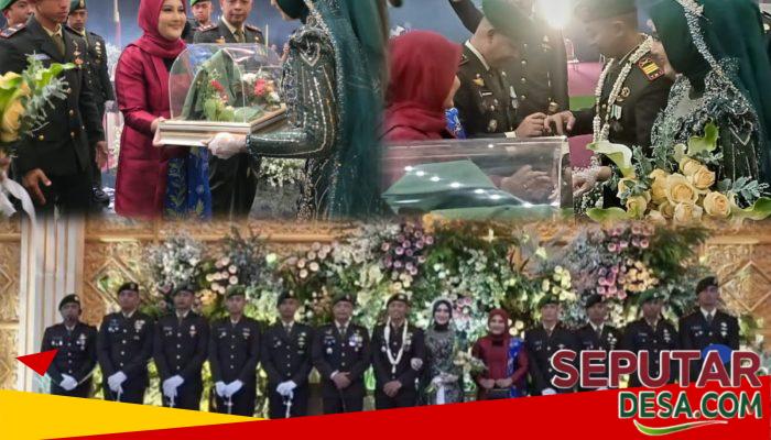 Pedang Pora Mengiringi Ikatan Suci, Dandim 0819 Pasuruan Sematkan Cincin di Pernikahan Perwira TNI AD