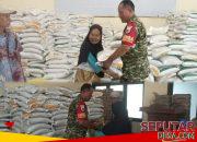Ringankan Beban Warga, Babinsa Dampingi Distribusi Bantuan Pangan Nasional