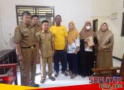 Pemdes Gumayun Serahkan Kompensasi Rp85 Juta untuk Pembangunan Jalan Usaha Tani