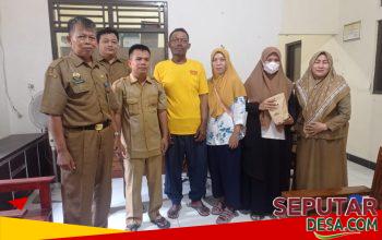 Pemdes Gumayun Serahkan Kompensasi Rp85 Juta untuk Pembangunan Jalan Usaha Tani