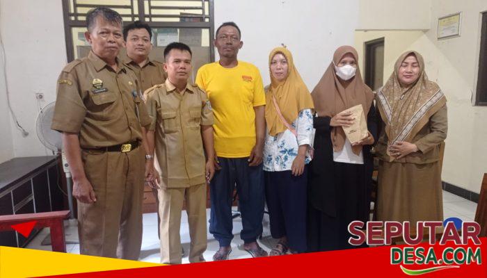 Pemdes Gumayun Serahkan Kompensasi Rp85 Juta untuk Pembangunan Jalan Usaha Tani