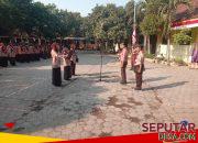 Peltu Zainal Makin Hadiri Apel Peringatan HUT Pramuka ke-65 Kecamatan Lekok