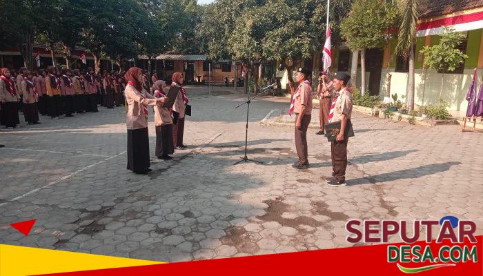 Peltu Zainal Makin Hadiri Apel Peringatan HUT Pramuka ke-65 Kecamatan Lekok